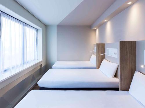 南阿姆斯特丹市宜必思经济型酒店客房内的一张或多张床位