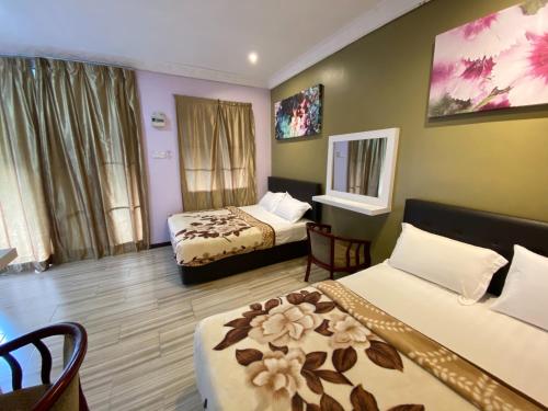 热浪岛德瑞姆巴酒店客房内的一张或多张床位