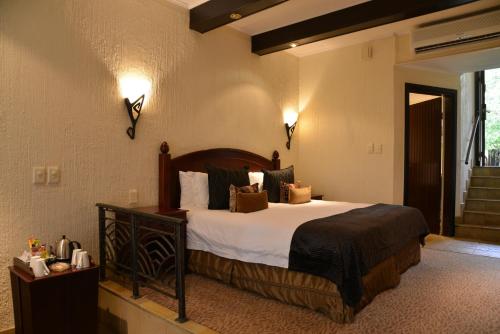 库瓦马里汀洛奇酒店客房内的一张或多张床位