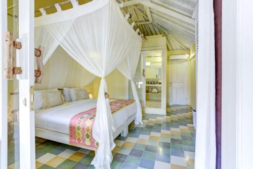 The Chillhouse Canggu by BVR Bali Holiday Rentals客房内的一张或多张床位