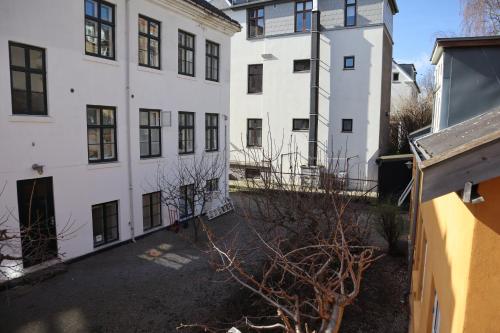 哥本哈根Rooms in quiet Yellow Courtyard Apartment的相册照片