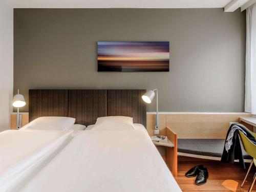 布莱梅中心宜必思酒店客房内的一张或多张床位