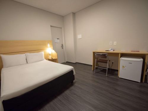 宜必思福塔莱萨普拉亚德伊拉谢马酒店 客房内的一张或多张床位