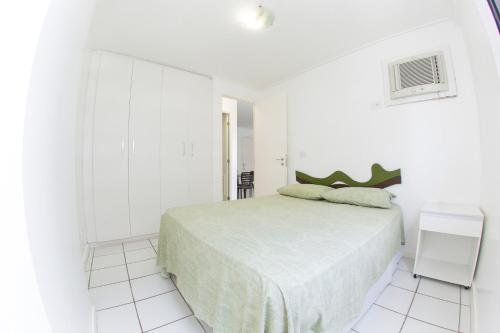 Flat Beira-Mar - NEO Pajuçara客房内的一张或多张床位