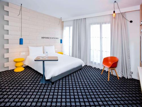 ibis Styles Chalons en Champagne Centre客房内的一张或多张床位