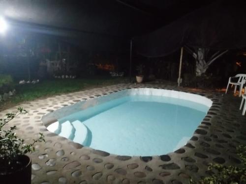 里韦拉Casa Campestre Rivera的后院的游泳池