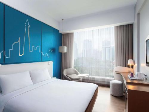 雅加达坦林全季酒店客房内的一张或多张床位