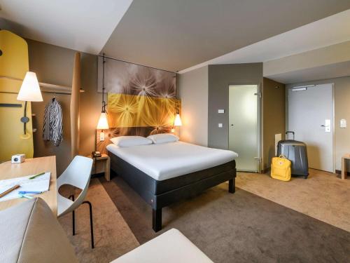 吕贝克市宜必思酒店客房内的一张或多张床位