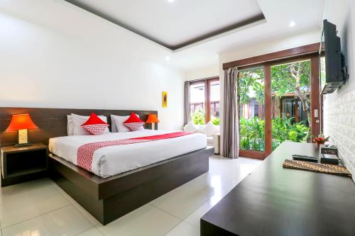 OYO 2316 The Light Bali Villas客房内的一张或多张床位