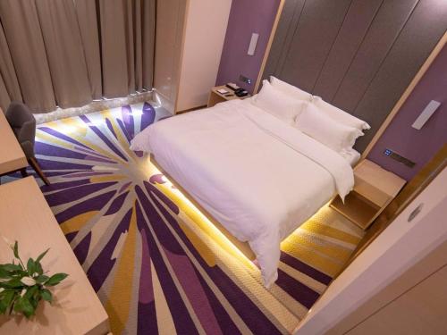 麗枫酒店·巴中财富中心店客房内的一张或多张床位