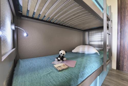 艾古斯科皮埃尔＆假期公寓客房内的一张或多张床位