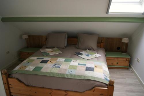 Vakantieboerderij 't Zand - Appartement客房内的一张或多张床位