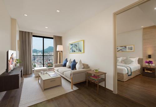 Somerset Harbourview Sri Racha - SHA Extra Plus客房内的一张或多张床位