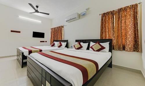 Sree Devi Niwas客房内的一张或多张床位