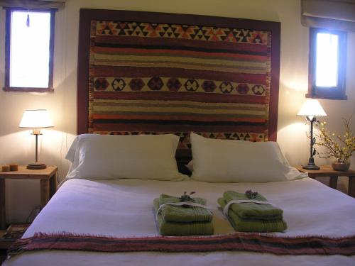 Ipacaa Lodge客房内的一张或多张床位