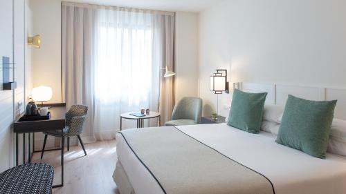 莫里纳拉里欧酒店客房内的一张或多张床位
