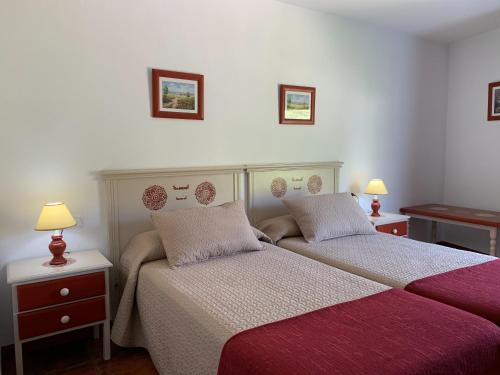 Hostal Atalaya en Capileira CB客房内的一张或多张床位