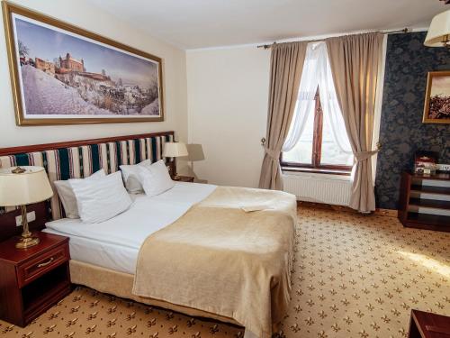 Hotel Zamek Gniew客房内的一张或多张床位
