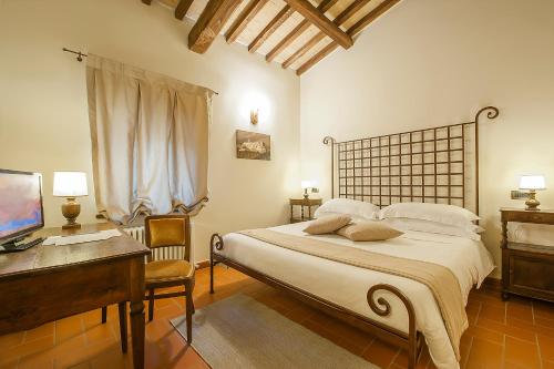 Convento di Acqua Premula客房内的一张或多张床位