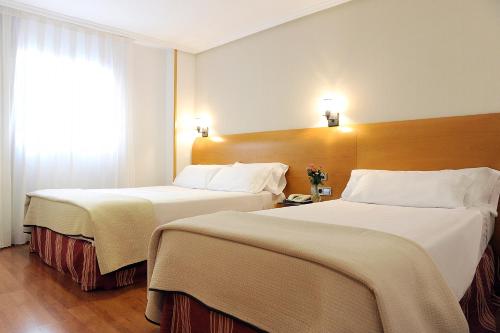 埃尔楚拉酒店客房内的一张或多张床位
