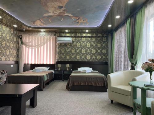 Mini-hotel "Lyubimyi"客房内的一张或多张床位