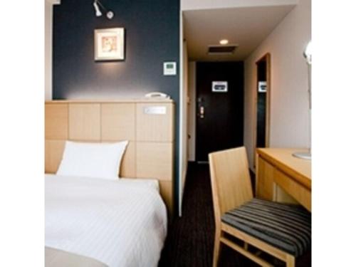 Hotel St Palace Kurayoshi - Vacation STAY 82268客房内的一张或多张床位