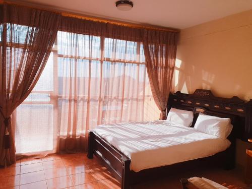 Alef Paradise Hotel客房内的一张或多张床位