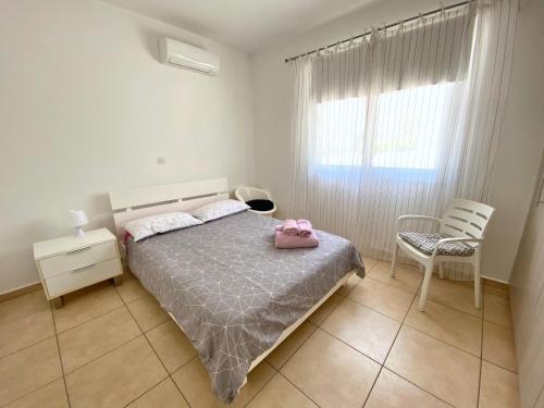 Mythical Sands Resort - Good Vibes Apartment客房内的一张或多张床位
