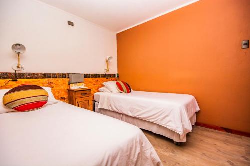 Hotel Casa Algarrobo客房内的一张或多张床位