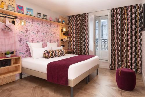 Hôtel LOCOMO客房内的一张或多张床位