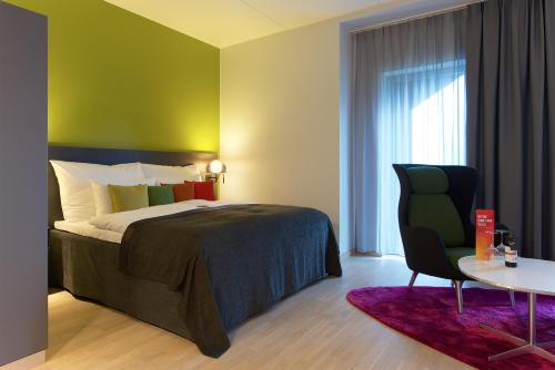 能源克拉丽奥酒店客房内的一张或多张床位
