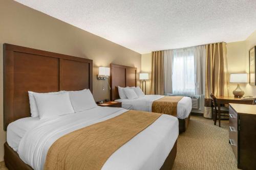 Comfort Inn Worland Hwy 16 to Yellowstone客房内的一张或多张床位