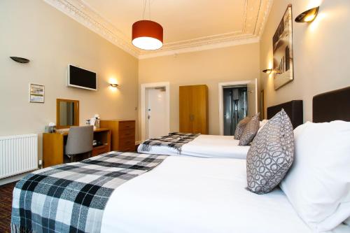 Kelvingrove Hotel - Sauchiehall St客房内的一张或多张床位