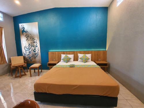 沙努尔阿贡酒店客房内的一张或多张床位