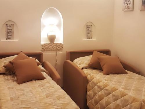 Il Centro Storico Ravello客房内的一张或多张床位