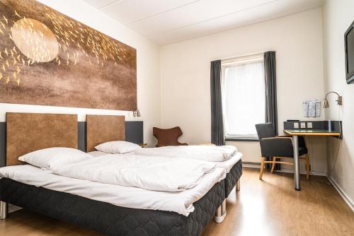 City Hotel Nattergalen客房内的一张或多张床位