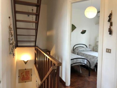 Holiday home Villetta Cinquale客房内的一张或多张床位