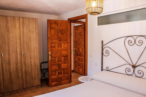 Apartamentos La Mar Chica客房内的一张或多张床位