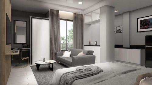 曼谷51 Suanplu Residence的客厅配有床和沙发
