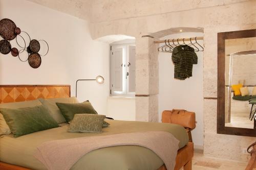 Monte Adamello - dimora nei trulli客房内的一张或多张床位