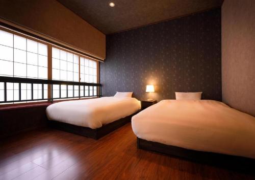 Dai Onsen Matsudaya Ryokan - Vacation STAY 67479客房内的一张或多张床位