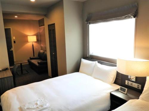 Act Hotel Roppongi - Vacation STAY 84273客房内的一张或多张床位