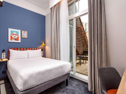 伦敦格洛斯特路宜必思尚品酒店客房内的一张或多张床位