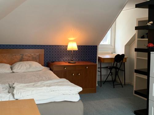博格贺尔姆图尔加坦别墅酒店客房内的一张或多张床位