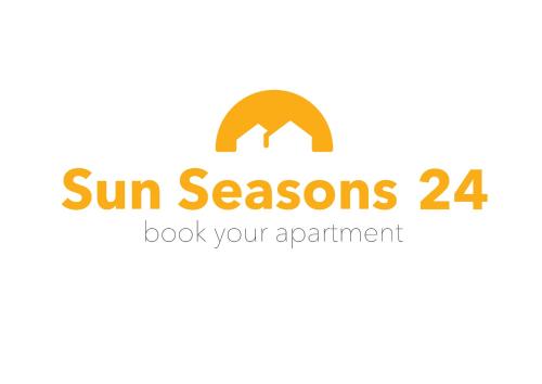 卡尔帕奇Apartamenty Sun Seasons 24 - Nadrzeczna I Centrum的阅读太阳季的标志,看你的约会