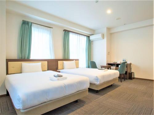 SHIN YOKOHAMA SK HOTEL - Non Smoking - Vacation STAY 86110客房内的一张或多张床位