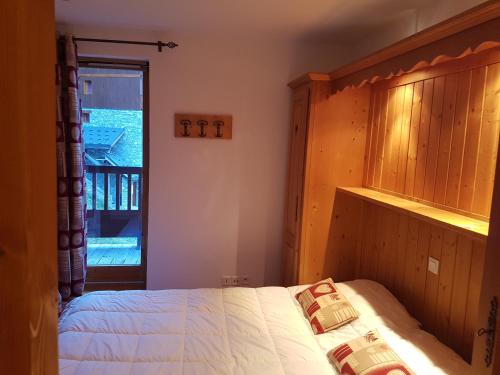 Appartement Le Pic Blanc客房内的一张或多张床位