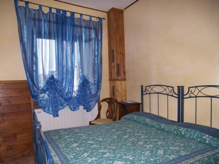 Osteria dei Tratturi Rooms客房内的一张或多张床位
