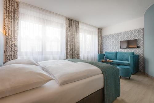 Hotel City Nord客房内的一张或多张床位