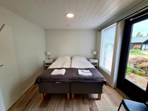 Kopparö Tammisaari客房内的一张或多张床位